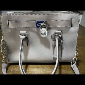 Gray Michael Kors bag.